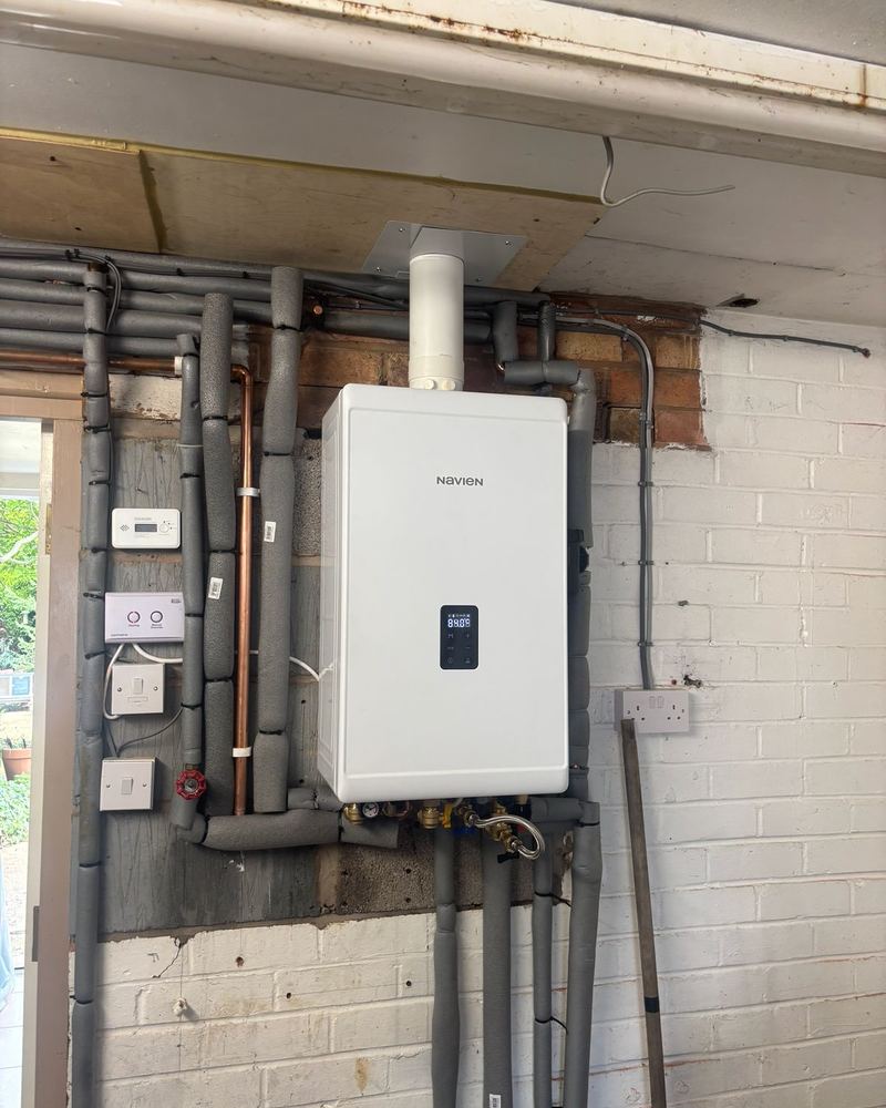 Navien combi boiler with insulated pipework